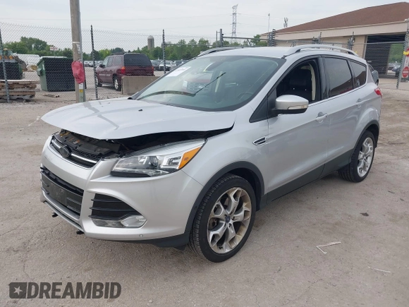 2013 Ford Escape Titanium with VIN 1FMCU9J97DUD16072, listed as a IAAI auction lot 42445993 with 111,255 mi miles and . Bid and sale history available at DreamBid. Image 2.
