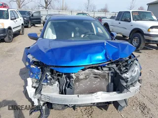 2018 Honda Civic Sedan LX with VIN 19XFC2F53JE019635, listed as a IAAI auction lot 41537152 with 74,958 mi miles. Bid and sale history available at carsss.com. Image 12.