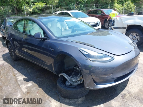 2023 Tesla Model 3 z VIN 5YJ3E1EA7PF413311, wystawiony jako IAAI lot #42442055 z przebiegiem 25 270 mil mil oraz . Historia ofert i sprzedaży dostępna na DreamBid. Obrazek 1.