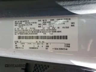 2018 Ford Transit с VIN 1FTBW3XMXJKB40404, выставлен на аукционе Copart как лот 50774585 с пробегом Не указан миль и Списание • Salvage title. История ставок и продаж доступна на DreamBid. Изображение 14.