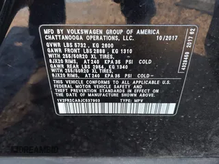 2018 Volkswagen Atlas SE with VIN 1V2FR2CA9JC537903, listed as a IAAI auction lot 41386874 with 118,764 mi miles and . Bid and sale history available at DreamBid. Image 9.