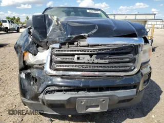 2018 GMC Canyon 2WD with VIN 1GTG5BEA0J1105758, listed as a Copart auction lot 74527294 with 103,259 mi miles and Salvage Title. Bid and sale history available at carsss.com. Image 5.