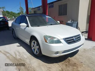 2002 Nissan Altima SE with VIN 1N4BL11D92C218274, listed as a IAAI auction lot 41788444 with 196,432 mi miles. Bid and sale history available at carsss.com. Image 1.