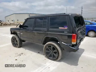 1998 Jeep Cherokee Sport z VIN 1J4FJ68S8WL193483, wystawiony jako Copart lot #58368705 z przebiegiem 94 462 mil mil oraz Szkoda całkowita • Salvage title. Historia ofert i sprzedaży dostępna na DreamBid. Obrazek 2.