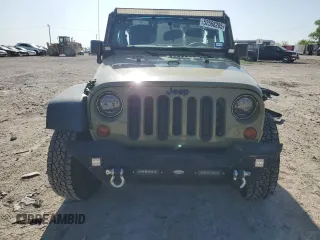 2013 Jeep Wrangler Sport with VIN 1C4AJWAG3DL649487, listed as a Copart auction lot 52568285 with 106,644 mi miles and Salvage title. Bid and sale history available at DreamBid. Image 5.