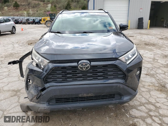 2019 Toyota RAV4 XLE with VIN JTMP1RFVXKD508099, listed as a Copart auction lot 51432015 with 90,487 mi miles and Salvage Title. Bid and sale history available at DreamBid. Image 5.