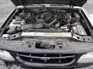 2000 Ford Explorer Limited with VIN 1FMDU75EXYZA76329, listed as a Copart auction lot 80952474 with 90,637 mi miles and Salvage title. Bid and sale history available at DreamBid. Image 13.