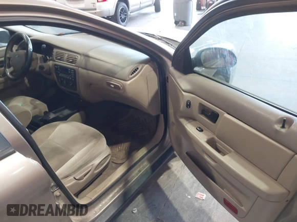 2006 Ford Taurus SE with VIN 1FAFP53U46A123827, listed as a IAAI auction lot 42042946 with 146,393 mi miles. Bid and sale history available at carsss.com. Image 5.