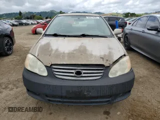 2004 Toyota Corolla CE with VIN 1NXBR32E54Z194835, listed as a Copart auction lot 52979495 with 299,999 mi miles and Clean Title. Bid and sale history available at DreamBid. Image 5.