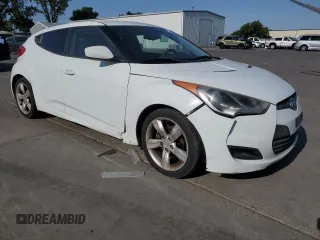 2012 Hyundai Veloster w/Gray Int with VIN KMHTC6AD9CU025190, listed as a Copart auction lot 59702755 with 188,579 mi miles and Salvage title. Bid and sale history available at DreamBid. Image 4.