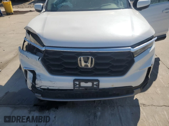 2024 Honda Pilot EX-L z VIN 5FNYG2H47RB006734, wystawiony jako Copart lot #78000524 z przebiegiem 23 960 mil mil oraz Szkoda całkowita • Salvage title. Historia ofert i sprzedaży dostępna na DreamBid. Obrazek 13.