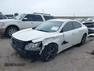 2014 Nissan Maxima S with VIN 1N4AA5AP6EC908751, listed as a IAAI auction lot 42624511 with 141,544 mi miles and . Bid and sale history available at DreamBid. Image 2.