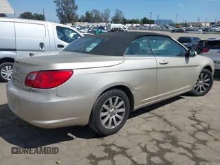 2010 Chrysler Sebring Touring with VIN 1C3BC5ED7AN142671, listed as a IAAI auction lot 42021533 with 115,098 mi miles and . Bid and sale history available at DreamBid. Image 4.