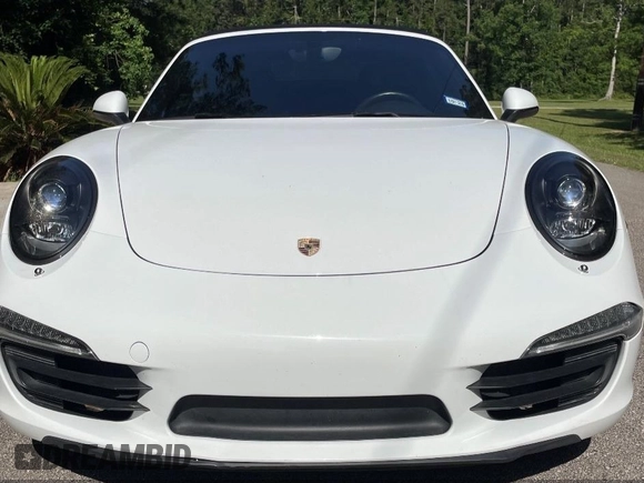 2014 Porsche 911 Carrera z VIN WP0CA2A92ES140453, wystawiony jako IAAI lot #42302853 z przebiegiem 47 879 mil mil oraz . Historia ofert i sprzedaży dostępna na DreamBid. Obrazek 1.