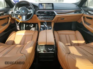 2018 BMW 5 Series M550i xDrive with VIN WBAJB9C58JG464461, listed as a Copart auction lot 53626575 with 62,436 mi miles and Salvage Title. Bid and sale history available at carsss.com. Image 8.