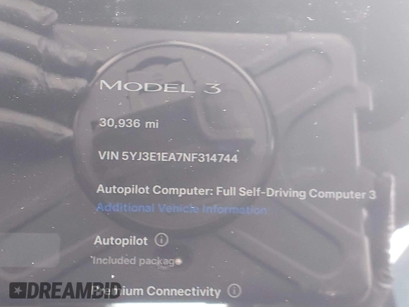 2022 Tesla Model 3 with VIN 5YJ3E1EA7NF314744, listed as a IAAI auction lot 42057596 with 30,936 mi miles and . Bid and sale history available at DreamBid. Image 15.