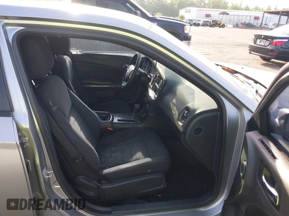 2014 Dodge Charger SE with VIN 2C3CDXBGXEH284832, listed as a IAAI auction lot 42069294 with 186,273 mi miles and . Bid and sale history available at carsss.com. Image 5.