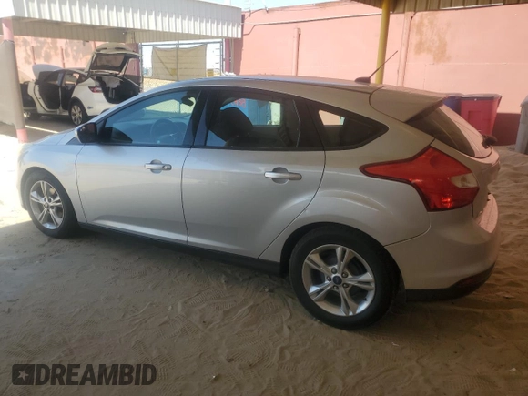 2014 Ford Focus SE z VIN 1FADP3K29EL239636, wystawiony jako Copart lot #59054945 z przebiegiem 130 960 mil mil oraz Czysty tytuł • Clean title. Historia ofert i sprzedaży dostępna na DreamBid. Obrazek 2.