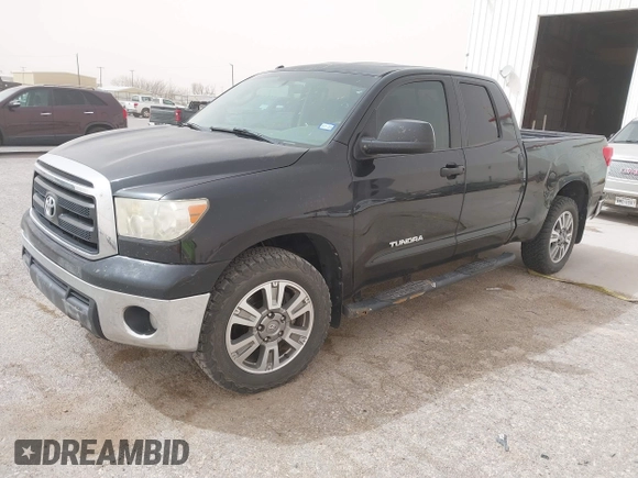 2013 Toyota Tundra z VIN 5TFRM5F19DX063197, wystawiony jako IAAI lot #41799886 z przebiegiem 351 859 mil mil oraz . Historia ofert i sprzedaży dostępna na DreamBid. Obrazek 17.
