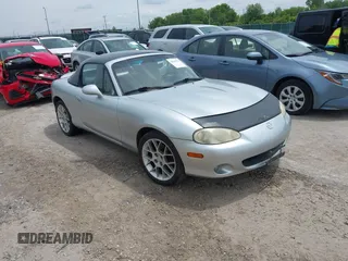 2002 Mazda MX-5 Miata Cloth z VIN JM1NB353420219700, wystawiony jako IAAI lot #42510532 z przebiegiem 168 498 mil mil oraz . Historia ofert i sprzedaży dostępna na DreamBid. Obrazek 1.