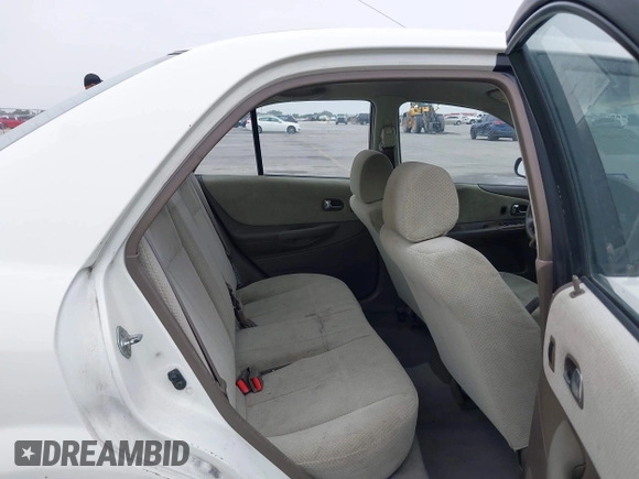 2000 Mazda Protege DX with VIN JM1BJ2220Y0273953, listed as a IAAI auction lot 41956058 with 158,837 mi miles and . Bid and sale history available at DreamBid. Image 8.