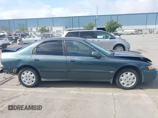 1996 Honda Accord LX with VIN 1HGCD5636TA182464, listed as a IAAI auction lot 41867521 with 191,832 mi miles and . Bid and sale history available at carsss.com. Image 14.