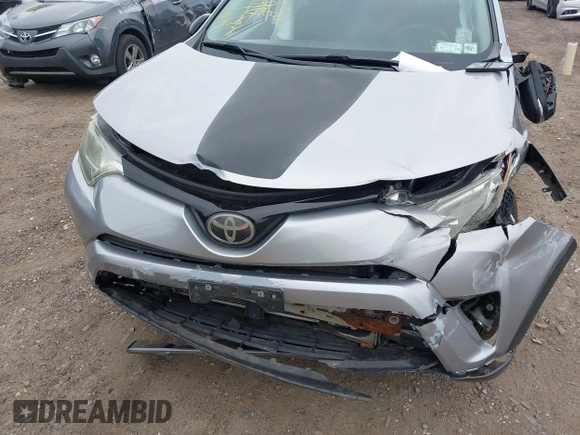 2018 Toyota RAV4 XLE with VIN 2T3RFREV1JW718474, listed as a IAAI auction lot 42144572 with 62,852 mi miles and . Bid and sale history available at DreamBid. Image 6.