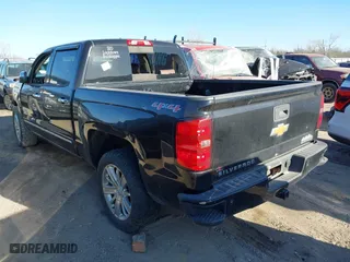 2014 Chevrolet Silverado 1500 High Country with VIN 3GCUKTEC1EG437170, listed as a IAAI auction lot 41742882 with 101,779 mi miles. Bid and sale history available at carsss.com. Image 3.