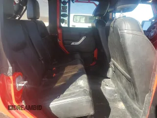 2016 Jeep Wrangler Unlimited Rubicon with VIN 1C4BJWFGXGL183011, listed as a Copart auction lot 42310535 with 165,227 mi miles and Salvage title. Bid and sale history available at DreamBid. Image 11.