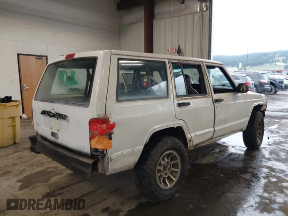 1997 Jeep Cherokee SE with VIN 1J4FJ28S1VL528218, listed as a IAAI auction lot 41931137 with 210,196 mi miles. Bid and sale history available at carsss.com. Image 4.