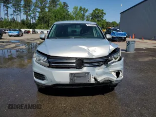 2012 Volkswagen Tiguan SE z VIN WVGAV7AX6CW543053, wystawiony jako Copart lot #53160825 z przebiegiem 167 185 mil mil oraz Szkody całkowita. Historia ofert i sprzedaży dostępna na DreamBid. Obrazek 5.