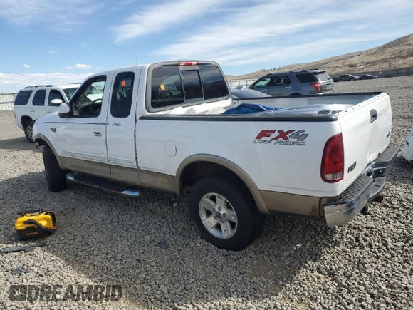 2003 Ford F-150 XL with VIN 1FTRX18L03NA96484, listed as a Copart auction lot 50834755 with 242,836 mi miles and Salvage title. Bid and sale history available at DreamBid. Image 2.