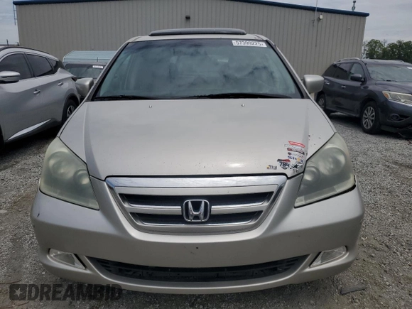 2006 Honda Odyssey Touring z VIN 5FNRL38886B000011, wystawiony jako Copart lot #57399225 z przebiegiem 256 217 mil mil oraz Szkoda całkowita • Salvage title. Historia ofert i sprzedaży dostępna na DreamBid. Obrazek 5.