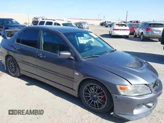 2006 Mitsubishi Lancer Evolution IX z VIN JA3AH86C56U016823, wystawiony jako IAAI lot #42298601 z przebiegiem 144 171 mil mil oraz . Historia ofert i sprzedaży dostępna na DreamBid. Obrazek 1.