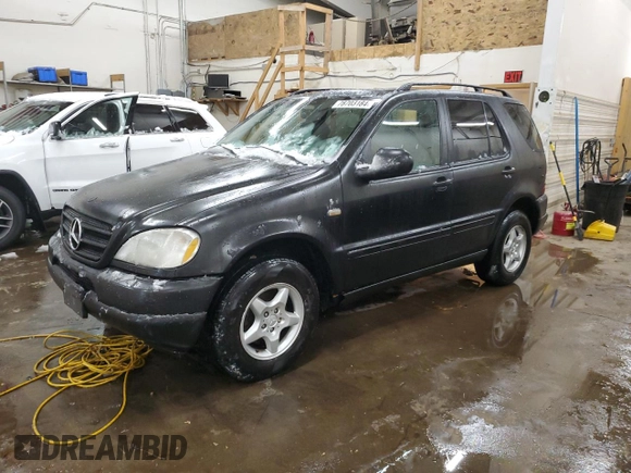 1999 Mercedes-Benz M-Class with VIN 4JGAB54E3XA101177, listed as a Copart auction lot 78703184 with 236,957 mi miles and Salvage Title. Bid and sale history available at carsss.com. Image 1.