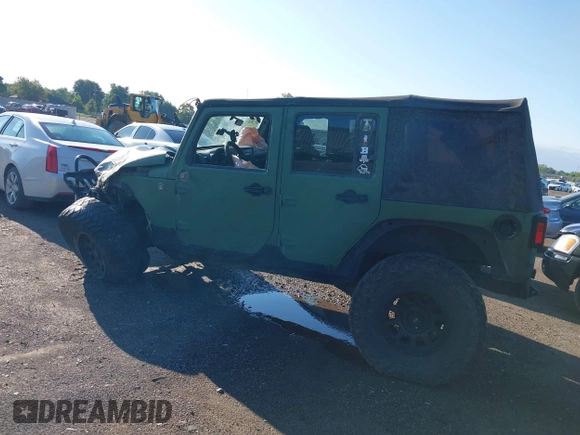 2008 Jeep Wrangler Unlimited X z VIN 1J4GA39198L612727, wystawiony jako IAAI lot #40128925 z przebiegiem 260 573 mil mil oraz . Historia ofert i sprzedaży dostępna na DreamBid. Obrazek 3.