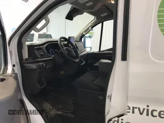 2020 Ford Transit Cargo with VIN 1FTBR2YG9LKA32434, listed as a IAAI auction lot 42718925 with 66,381 mi miles and . Bid and sale history available at DreamBid. Image 6.