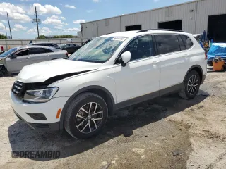 2021 Volkswagen Tiguan SE z VIN 3VV3B7AX4MM000468, wystawiony jako Copart lot #56468415 z przebiegiem 55 280 mil mil oraz Szkoda całkowita • Salvage title. Historia ofert i sprzedaży dostępna na DreamBid. Obrazek 1.