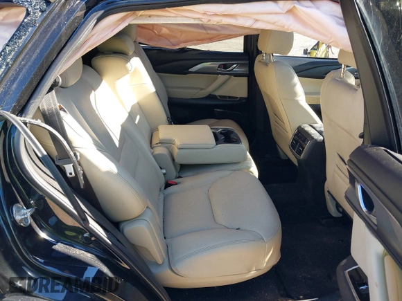 2018 Mazda CX-9 Grand Touring z VIN JM3TCADY5J0204845, wystawiony jako IAAI lot #41292695 z przebiegiem 98 751 mil mil oraz . Historia ofert i sprzedaży dostępna na DreamBid. Obrazek 8.