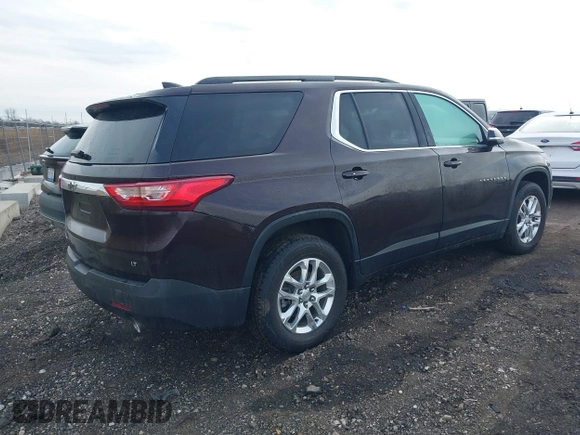 2021 Chevrolet Traverse LT Cloth with VIN 1GNEVGKW2MJ134615, listed as a IAAI auction lot 41667174 with 52,717 mi miles. Bid and sale history available at carsss.com. Image 4.