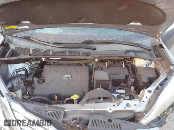 2016 Toyota Sienna LE with VIN 5TDJK3DC4GS133694, listed as a IAAI auction lot 41171171 with 99,680 mi miles. Bid and sale history available at carsss.com. Image 10.