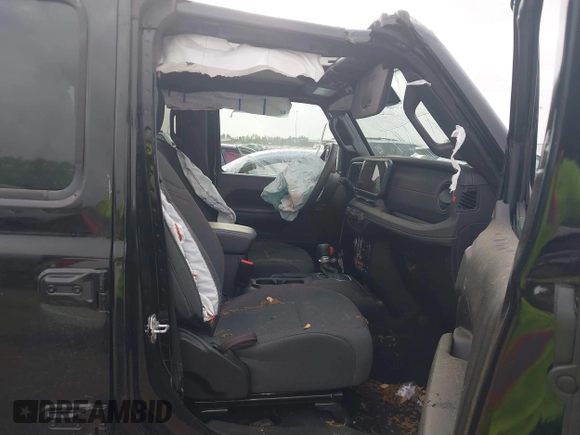 2024 Jeep Wrangler Rubicon with VIN 1C4PJXFG6RW337596, listed as a IAAI auction lot 41958788 with 15,942 mi miles and . Bid and sale history available at DreamBid. Image 5.