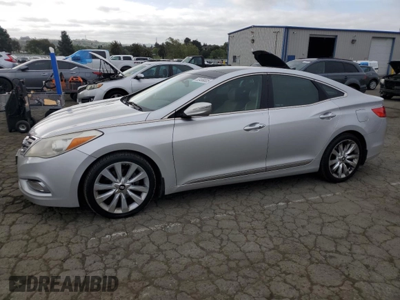 2012 Hyundai Azera z VIN KMHFH4JGXCA123949, wystawiony jako Copart lot #53499005 z przebiegiem 184 083 mil mil oraz Czysty tytuł • Clean title. Historia ofert i sprzedaży dostępna na DreamBid. Obrazek 1.