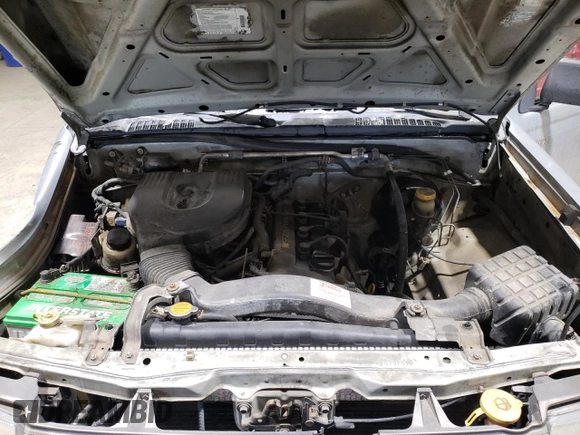 2000 Nissan Frontier XE z VIN 1N6DD21S1YC392012, wystawiony jako Copart lot #41843855 z przebiegiem 208 449 mil mil oraz Szkoda całkowita • Salvage title. Historia ofert i sprzedaży dostępna na DreamBid. Obrazek 11.