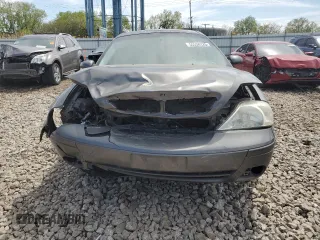 2005 Mercury Sable LS z VIN 1MEFM55S75A619345, wystawiony jako Copart lot #55858325 z przebiegiem Nie podano mil oraz Szkoda całkowita • Salvage title. Historia ofert i sprzedaży dostępna na DreamBid. Obrazek 5.