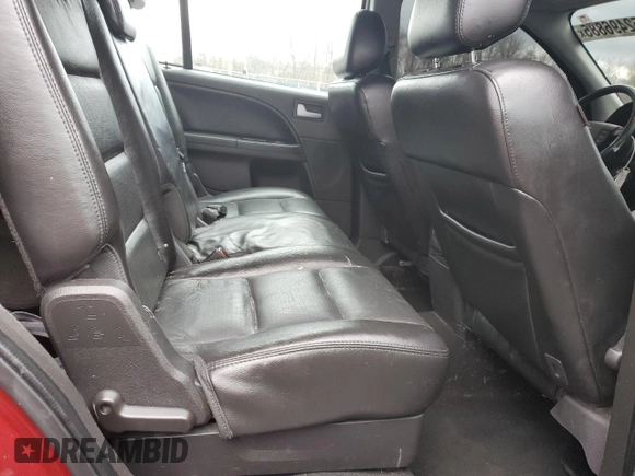 2005 Ford Freestyle Limited z VIN 1FMDK06165GA06262, wystawiony jako Copart lot #52496885 z przebiegiem 161 759 mil mil oraz Szkoda całkowita • Salvage title. Historia ofert i sprzedaży dostępna na DreamBid. Obrazek 11.