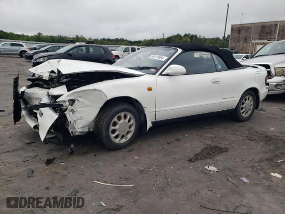 1992 Toyota Celica with VIN ST1830048648, listed as a Copart auction lot 69418964 with 72,082 mi miles and Salvage title. Bid and sale history available at DreamBid. Image 1.