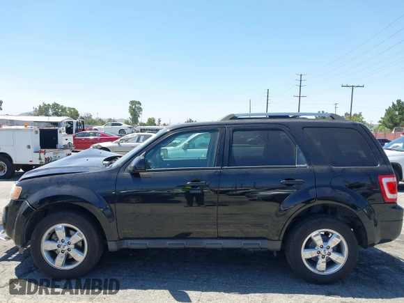 2012 Ford Escape Limited z VIN 1FMCU0EG0CKC18936, wystawiony jako IAAI lot #42303201 z przebiegiem 132 416 mil mil oraz . Historia ofert i sprzedaży dostępna na DreamBid. Obrazek 14.