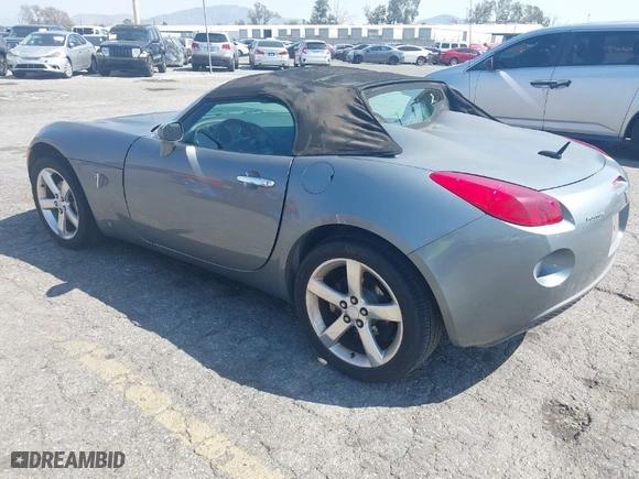 2007 Pontiac Solstice with VIN 1G2MB35B47Y114607, listed as a IAAI auction lot 41992049 with 127,702 mi miles. Bid and sale history available at carsss.com. Image 3.