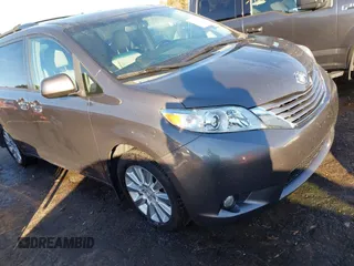 2015 Toyota Sienna Ltd with VIN 5TDDK3DC2FS105016, listed as a IAAI auction lot 41288447 with 94,585 mi miles. Bid and sale history available at carsss.com. Image 1.